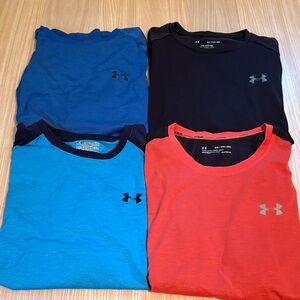 Under Armour set of 4 tee shirts blue red black